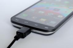 Is it possible to charge an iPhone using an iPad charger?